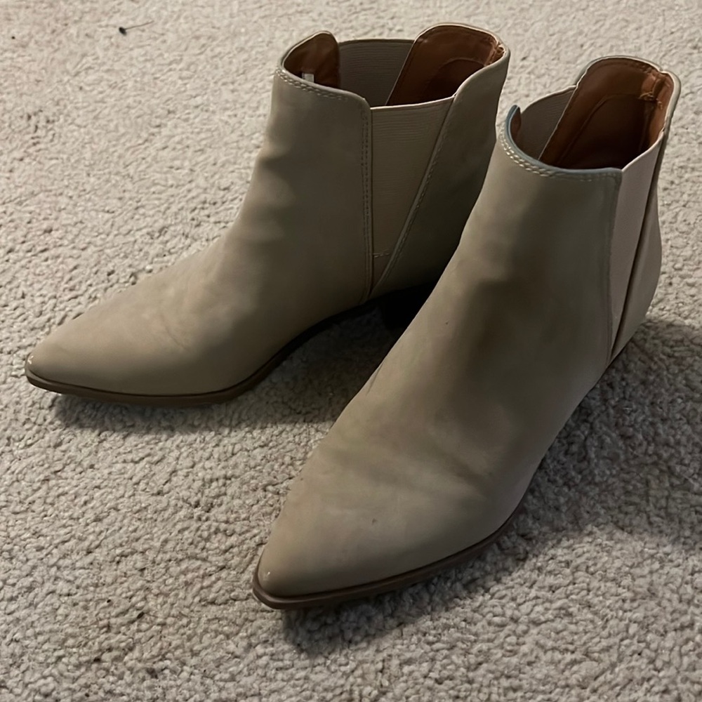 I am selling a beige Chelsea Boot. Lightly warn.